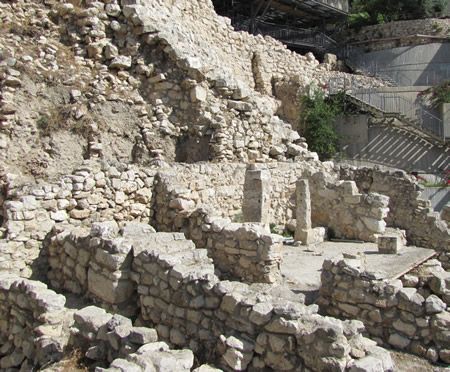 Remains of houses and rooms at the base of the Millo (Jebusite Wall, Stepped Stone Structure) from the 586 BC fires of Jerusalem set by the Babylonian conquerors.