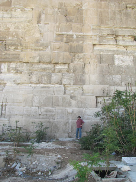 Galyn stands by some of the Herodian ashlar stones at the south end of the Eastern wall of the Temple Mount, which is also the east wall of the Old City Jerusalem.