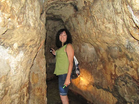 Toni Wiemers in Hezekiah's Tunnel that was cut through the bedrock under the old City of David in 701 BC to bring water from the Gihon Springs to the Pool of Siloam. 