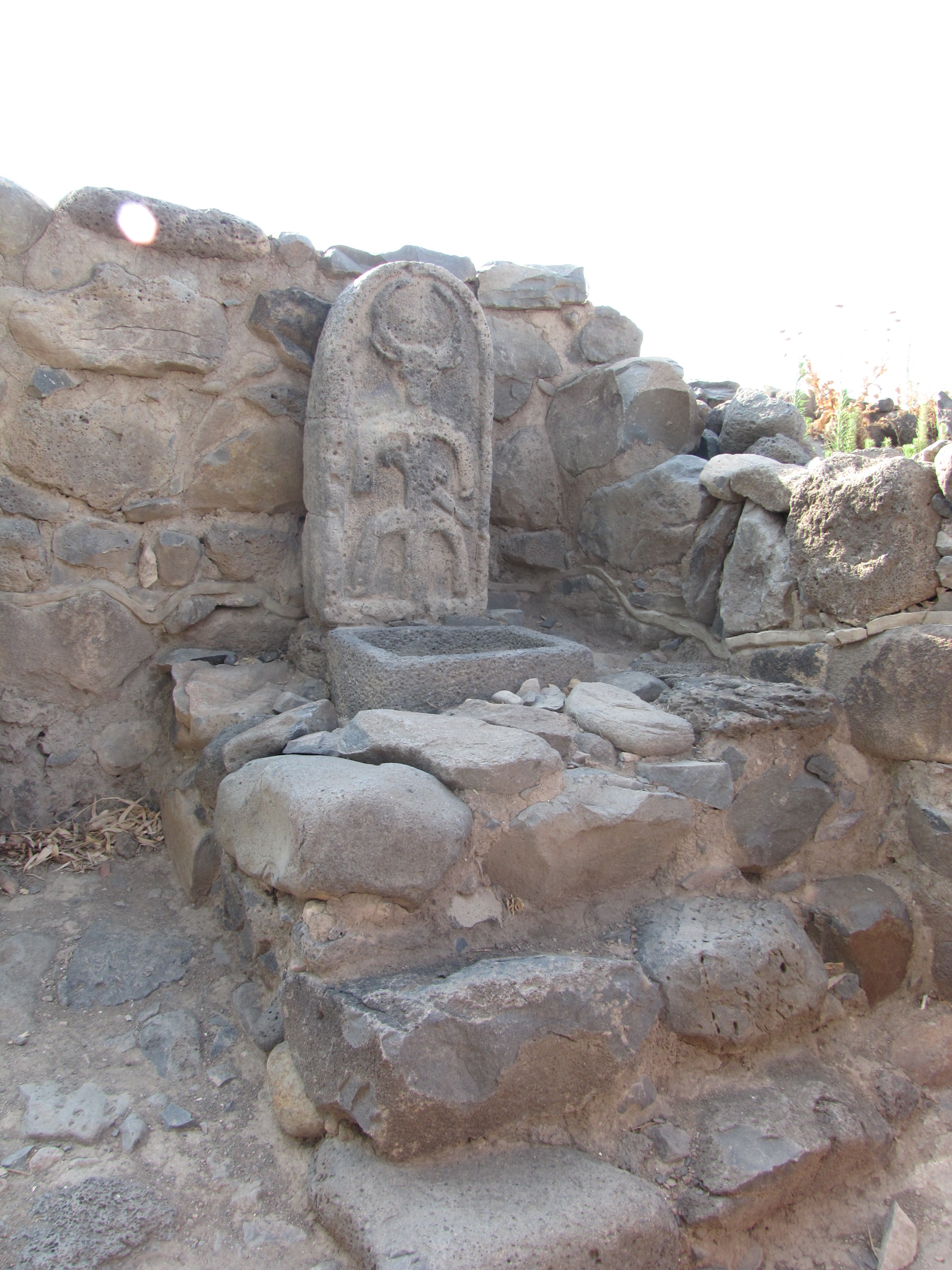 Geshur high place with three steps up to the basin for offerings to Hadad stella, an inscribed standing stone