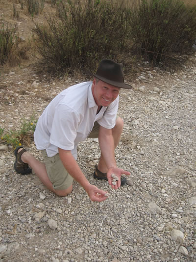 Galyn Wiemers picks up five smooth stones from a dry creek bed in the Valley of Elah between Socoh and Azekah