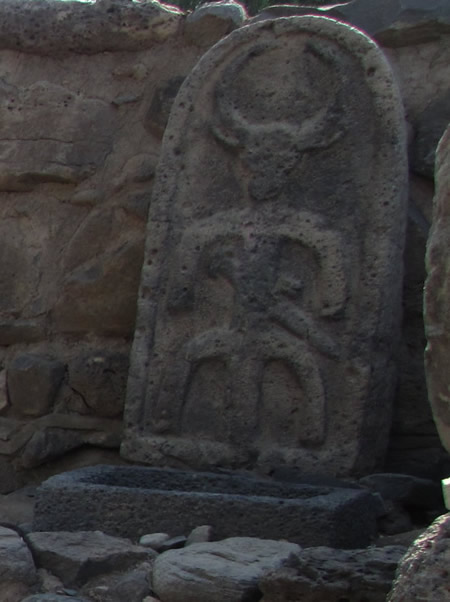 Geshur East Gate with standing stone, high place, stela with bull head on image with tripod wearing a sword
