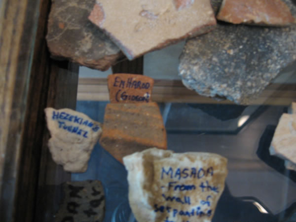Pieces from En Harod where Gideon's men drank and latter broke their clay jars going into battle.  Also a rock from the Serpantine Trail coming down the side of Masada.  A small stone from Hezekiah's tunnel picked up under the city of David, the Jerusalem of the Old Testament.