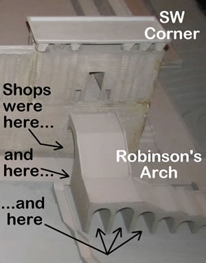 Details of Robinson's Arch and the first century shops labeled on a model. 