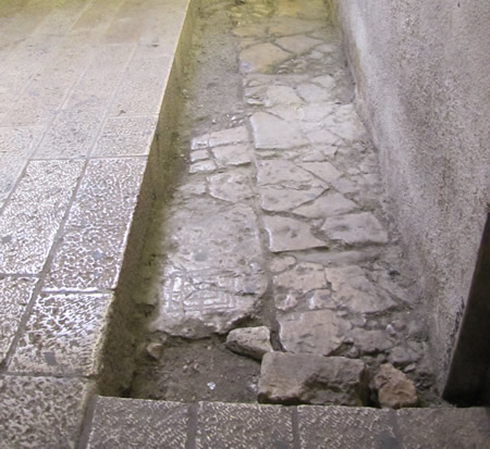 The original Cardo pavement is preserved with the Roman game board cut into the lower left stone of the original street. This was cut sometime after Hadrian's rebuilding of the city of Jerusalem and renaming it Aelila Capitolina.