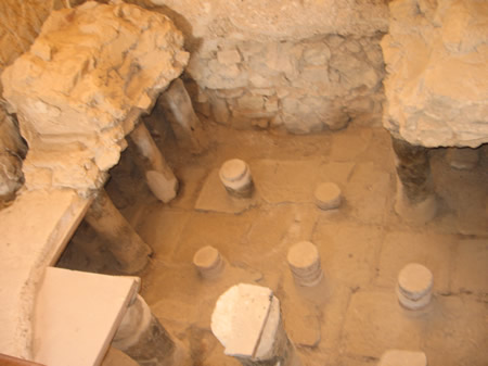 A bath house at Masada. The floor (missing) was supported on the pillars and steam filled the area below the floor to make the bath room or steam room warm.