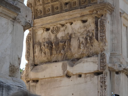 Inside the Arch of Titus in Rome the Temple furniture (Lampstand and Table of Shewbread) and treasures (silver trumpets, urns, etc.) can be seen being carried into Rome after the 70 AD destruction of Jerusalem and the Temple.
