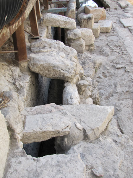 stone covered water channel at the pool of siloam