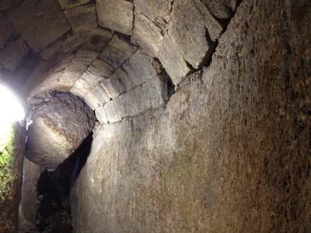 Fallen ashlar in gutter below the street under Robinson's Arch