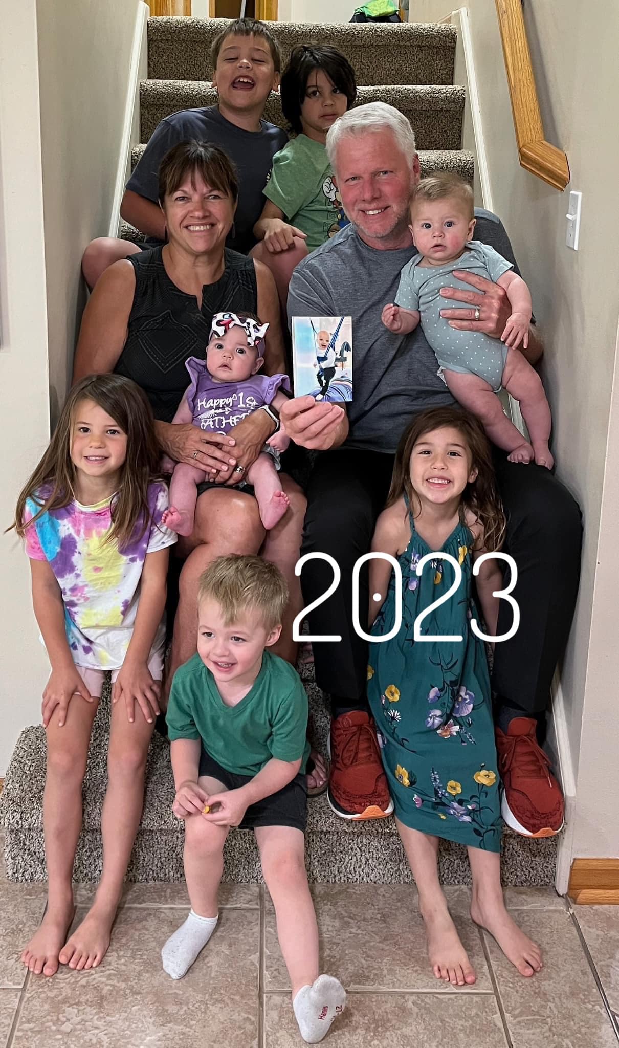 Galyn and Toni Wiemers with seven grandchildren 2023