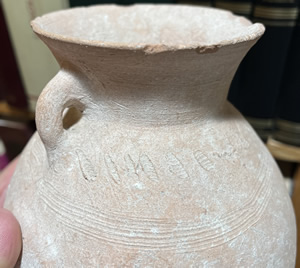 2300-2000 BC, A clay storage Jug, a decorated Terracotta Jar