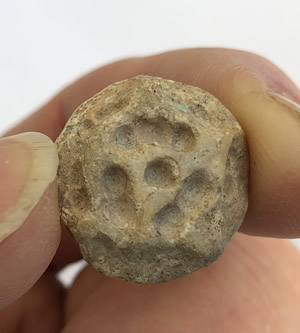 3200 BC Crème Calcite Conoid Stamp Seal with deep drilled grooves and dots forming a rosette design