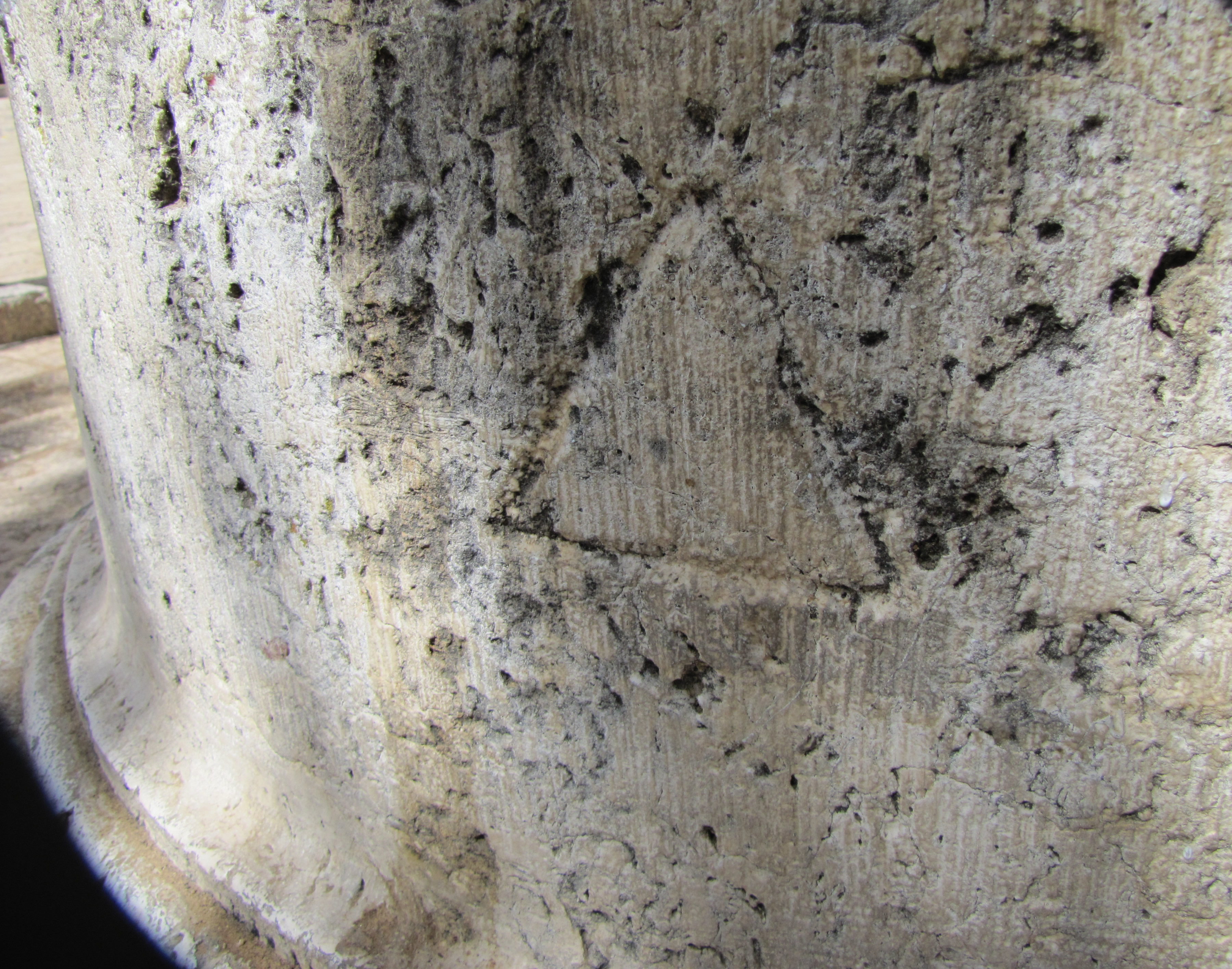 Roman inscribed Delta for number 4, letter D on column base in Jerusalem