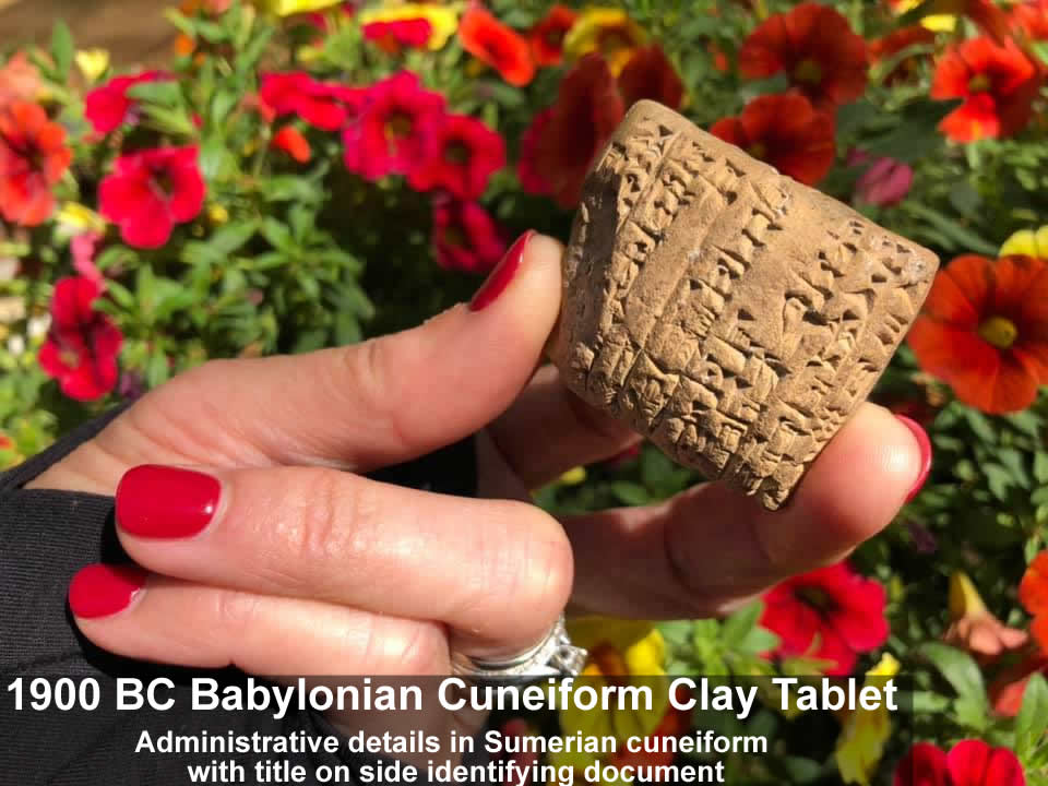 1900 BC Babylonian Cuneiform clay tablet with administrative details in Sumerian cuneiform, title on side of tablet