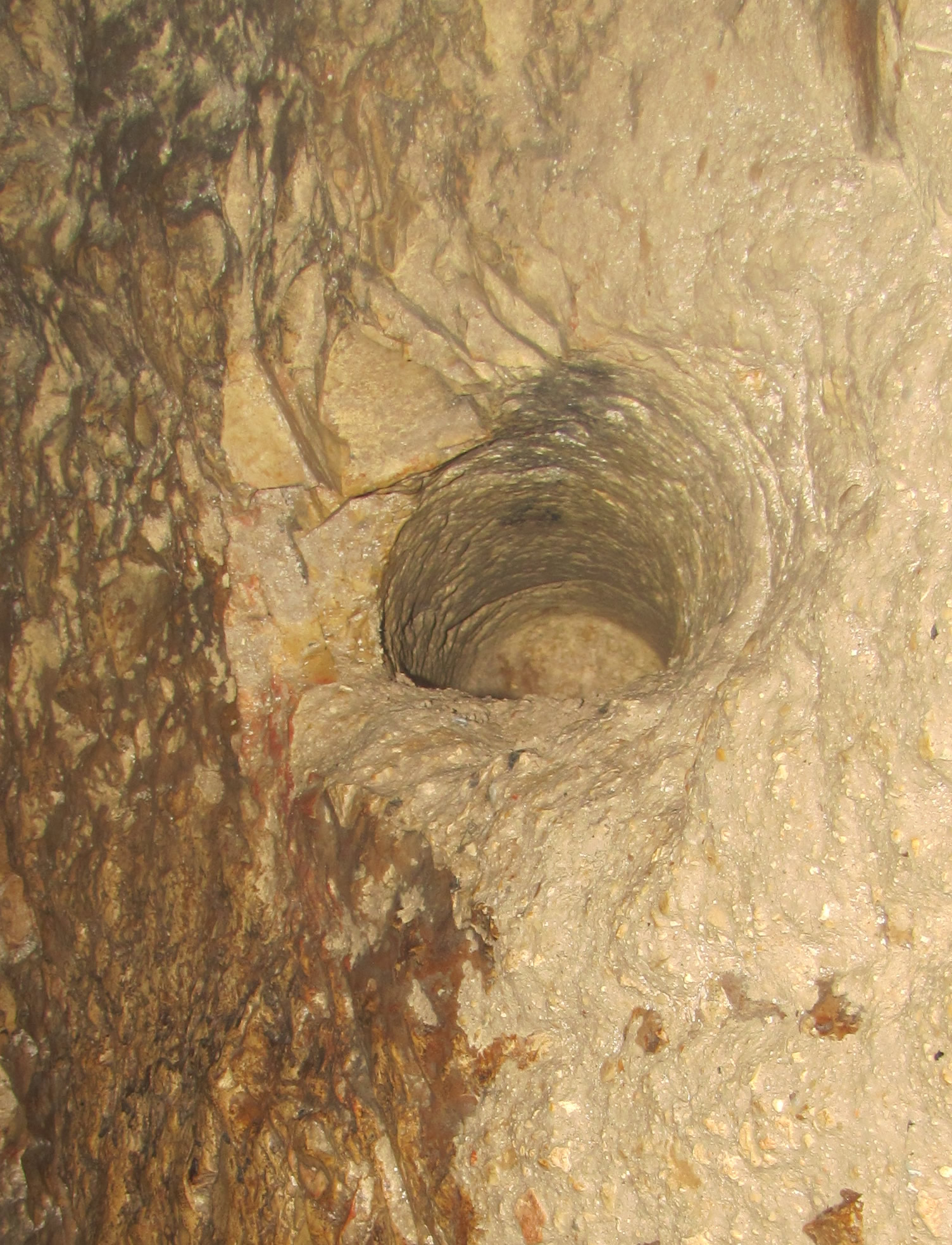 Hole for holding torch or light in Hezekiah's Tunnel