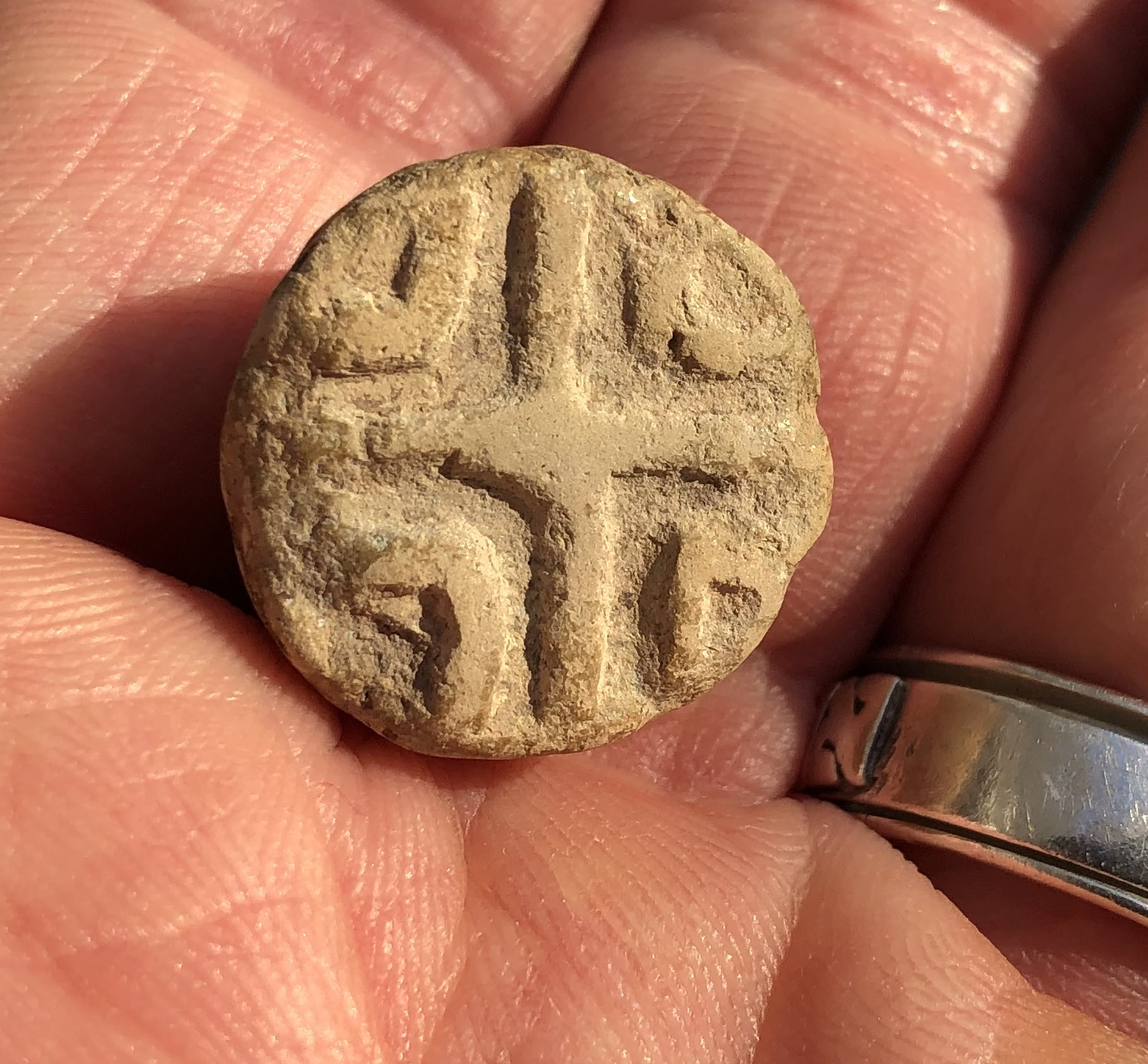 2000 1000 BC Terracotta Conoid Seal from Iran with angled cross view seal side